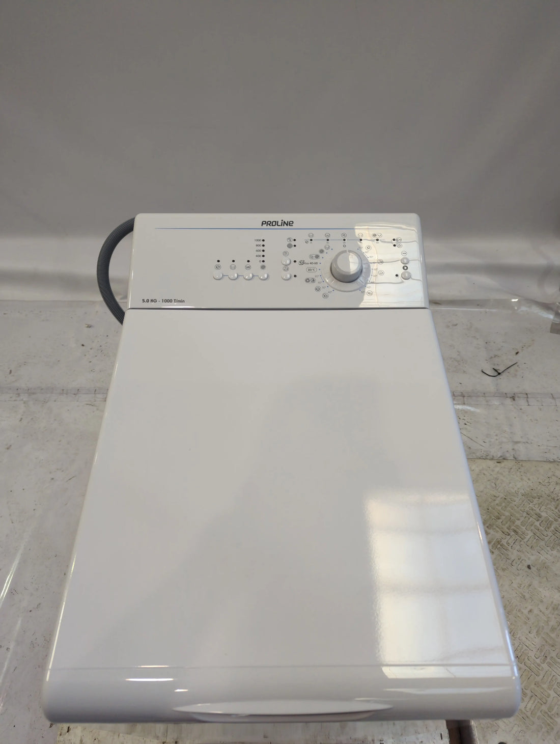 Lave-Linge Top 5 kg Reconditionné PROLINE PTL5100/N : vue du haut ouverture et commandes